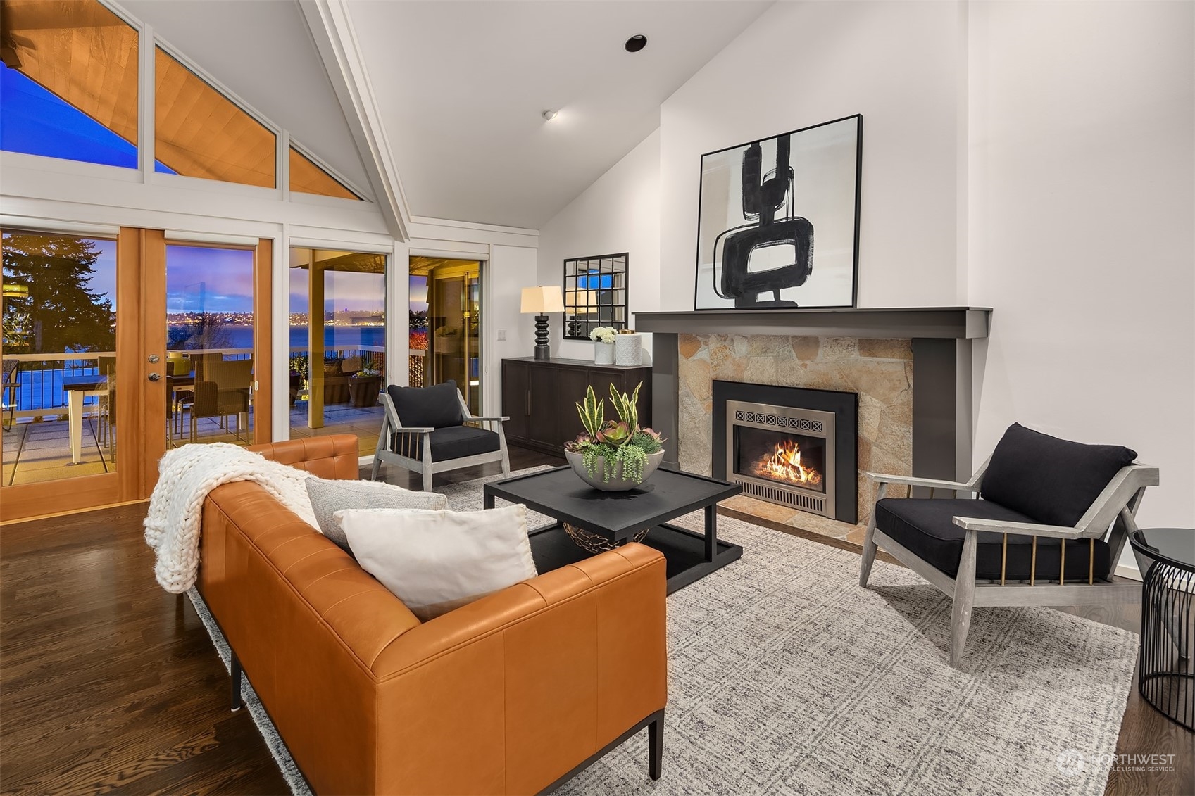 8457 Midland Road Medina, WA 98039 - Photo 7 of 40 a living room with furniture and a fireplace