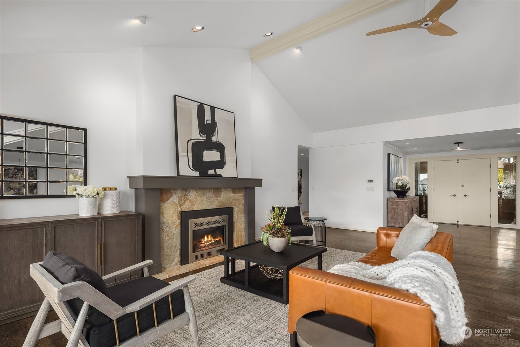 8457 Midland Road Medina, WA 98039 - Photo 8 of 40 a living room with furniture and a fireplace