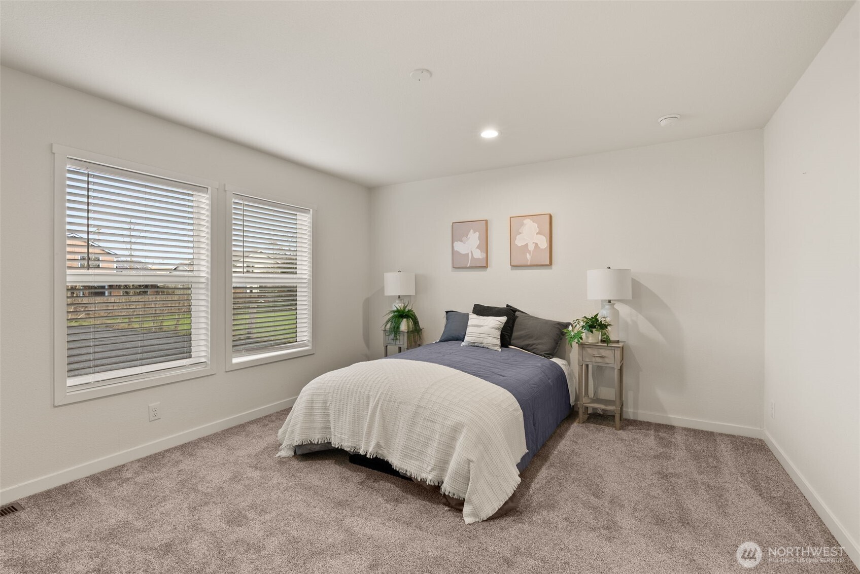 1243 Southwest Elzina Street Chehalis, WA 98532 - Photo 11 of 30 a bedroom with a bed and a window