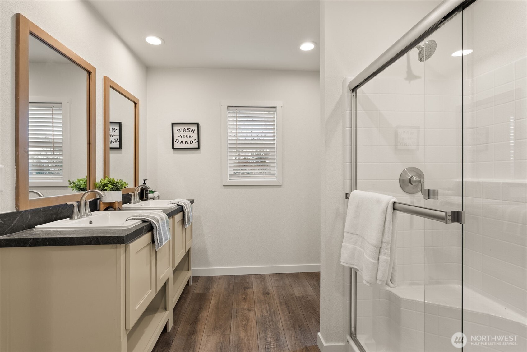 1243 Southwest Elzina Street Chehalis, WA 98532 - Photo 13 of 30 a bathroom with a granite countertop sink a mirror and shower