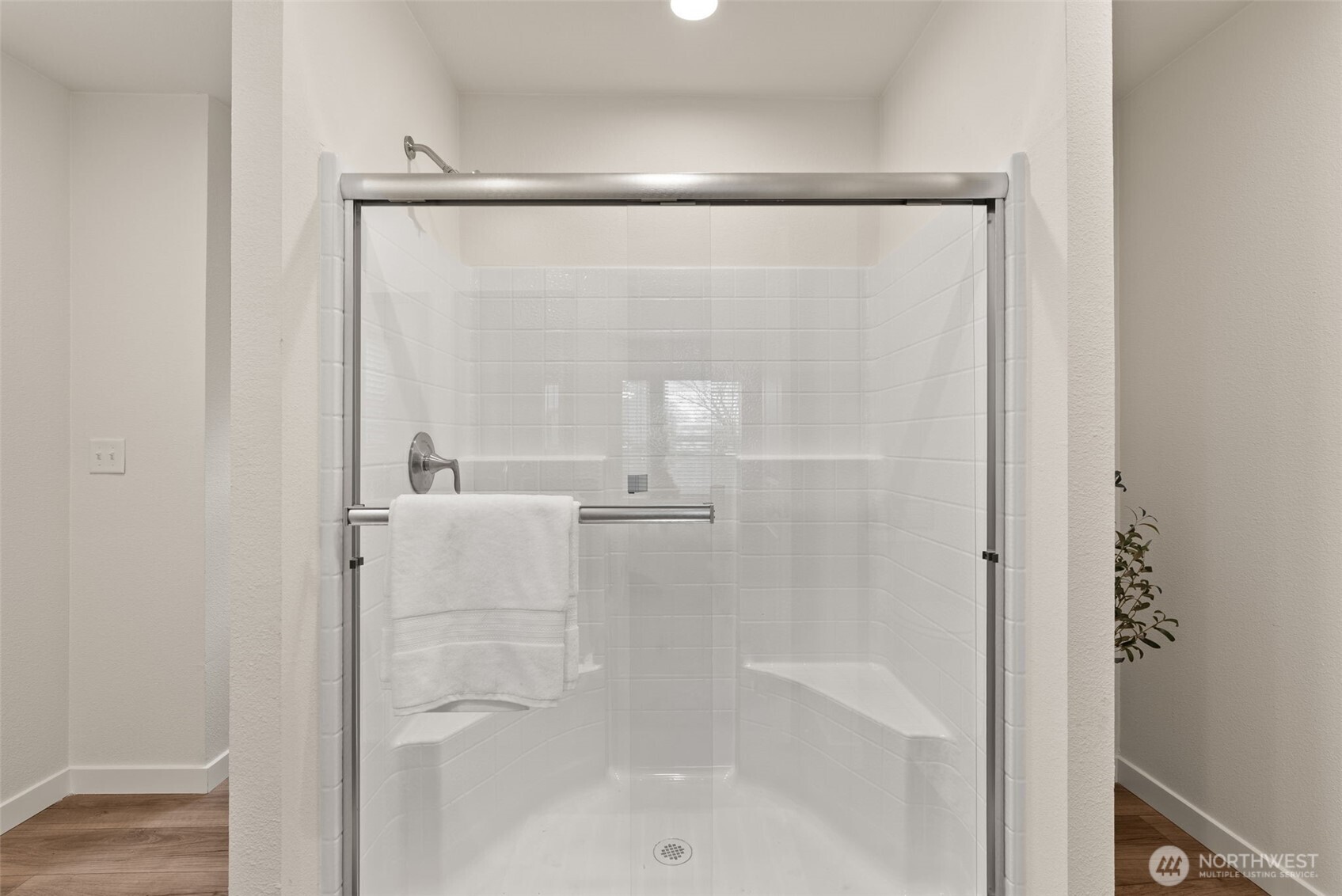 1243 Southwest Elzina Street Chehalis, WA 98532 - Photo 15 of 30 a bathroom with a glass shower door