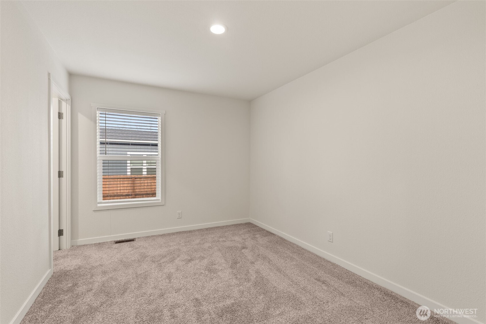 1243 Southwest Elzina Street Chehalis, WA 98532 - Photo 17 of 30 an empty room with a window