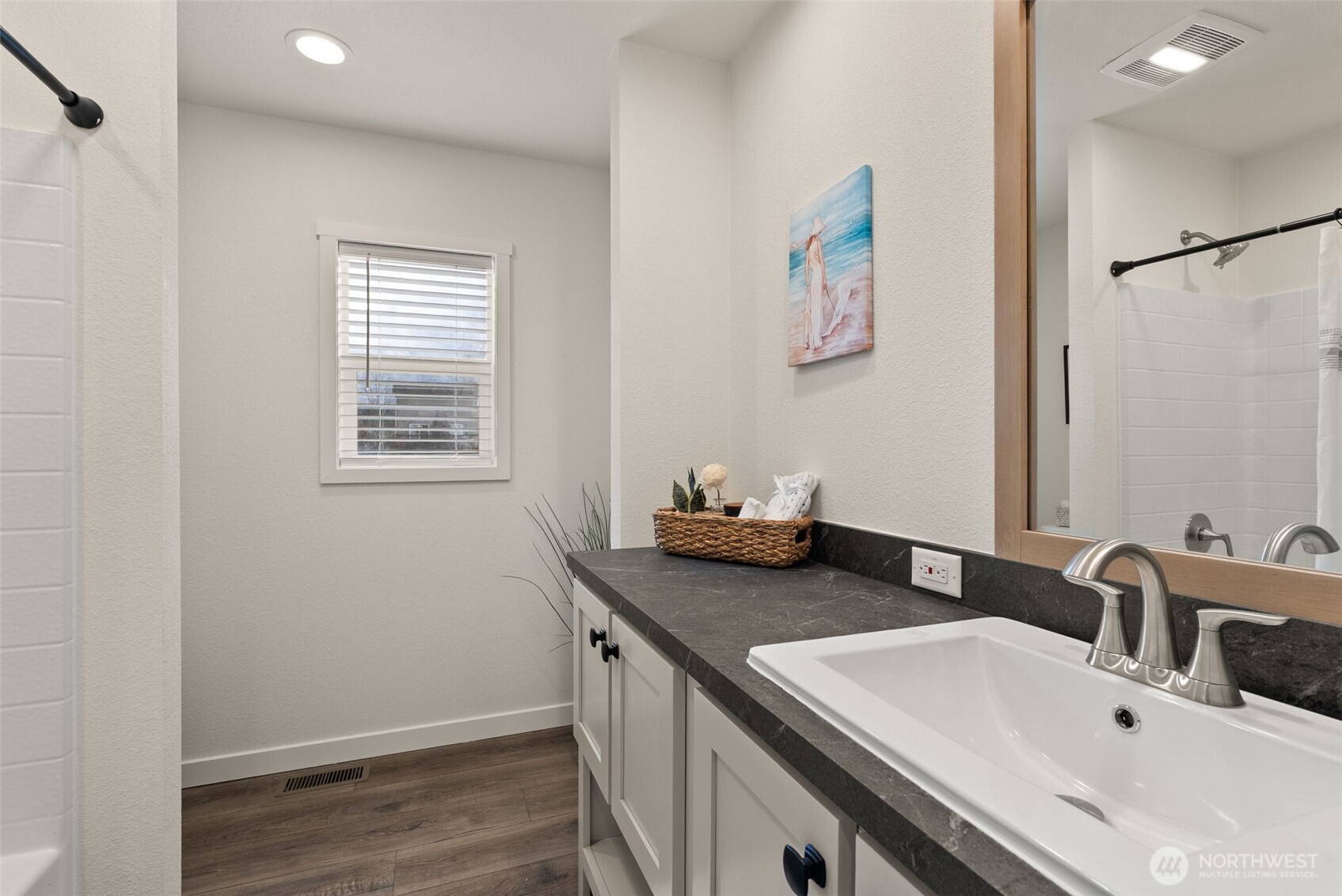 1243 Southwest Elzina Street Chehalis, WA 98532 - Photo 19 of 30 a bathroom with a sink and a mirror