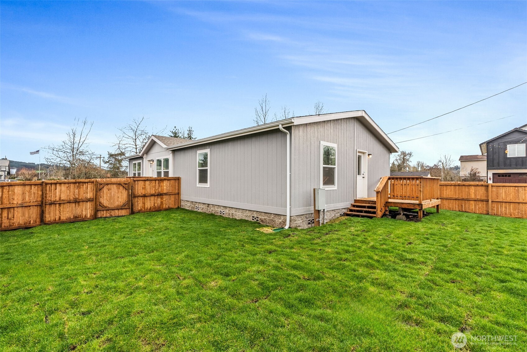 1243 Southwest Elzina Street Chehalis, WA 98532 - Photo 22 of 30 a view of a house with backyard