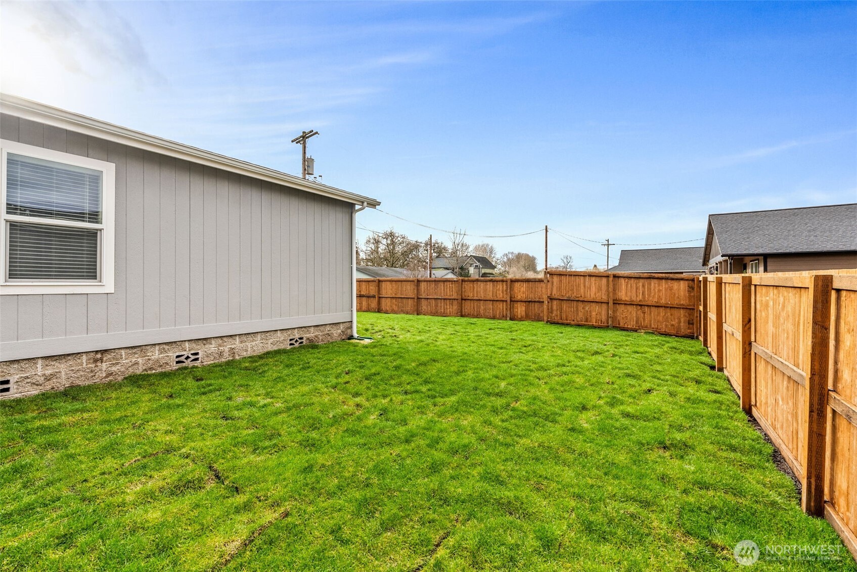 1243 Southwest Elzina Street Chehalis, WA 98532 - Photo 27 of 30 a view of a backyard with a garden