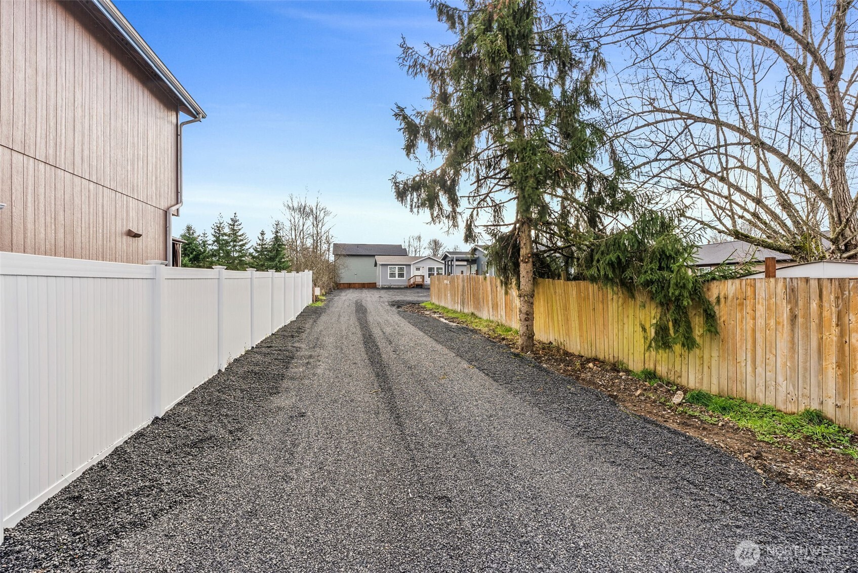 1243 Southwest Elzina Street Chehalis, WA 98532 - Photo 29 of 30 a view of a backyard with wooden fence