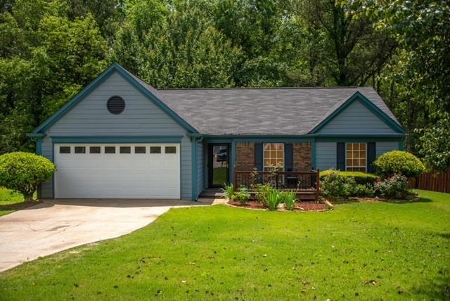 3935 Wintersweet Drive Decatur, GA 30034 - Photo 1 of 1 a front view of house with yard and green space