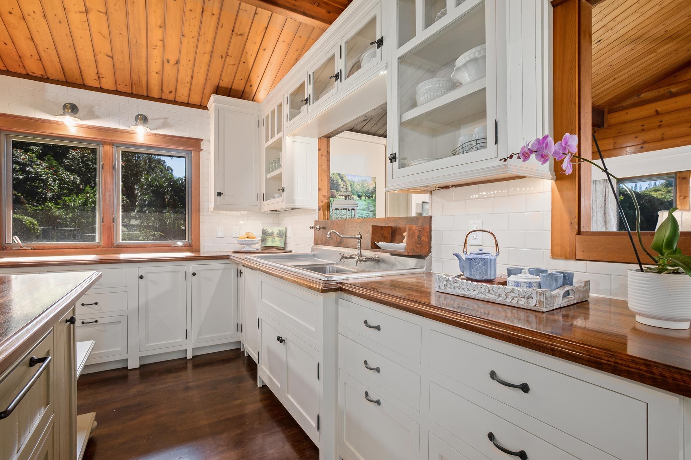 30 Mamao Place Haiku, HI 96708 - Photo 12 of 50 a kitchen with sink stove and cabinets