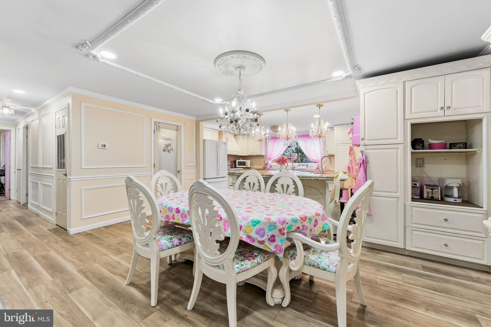 252 Red Pump Road Rising Sun, MD 21911 - Photo 15 of 41 a view of a dining room with furniture and chandelier