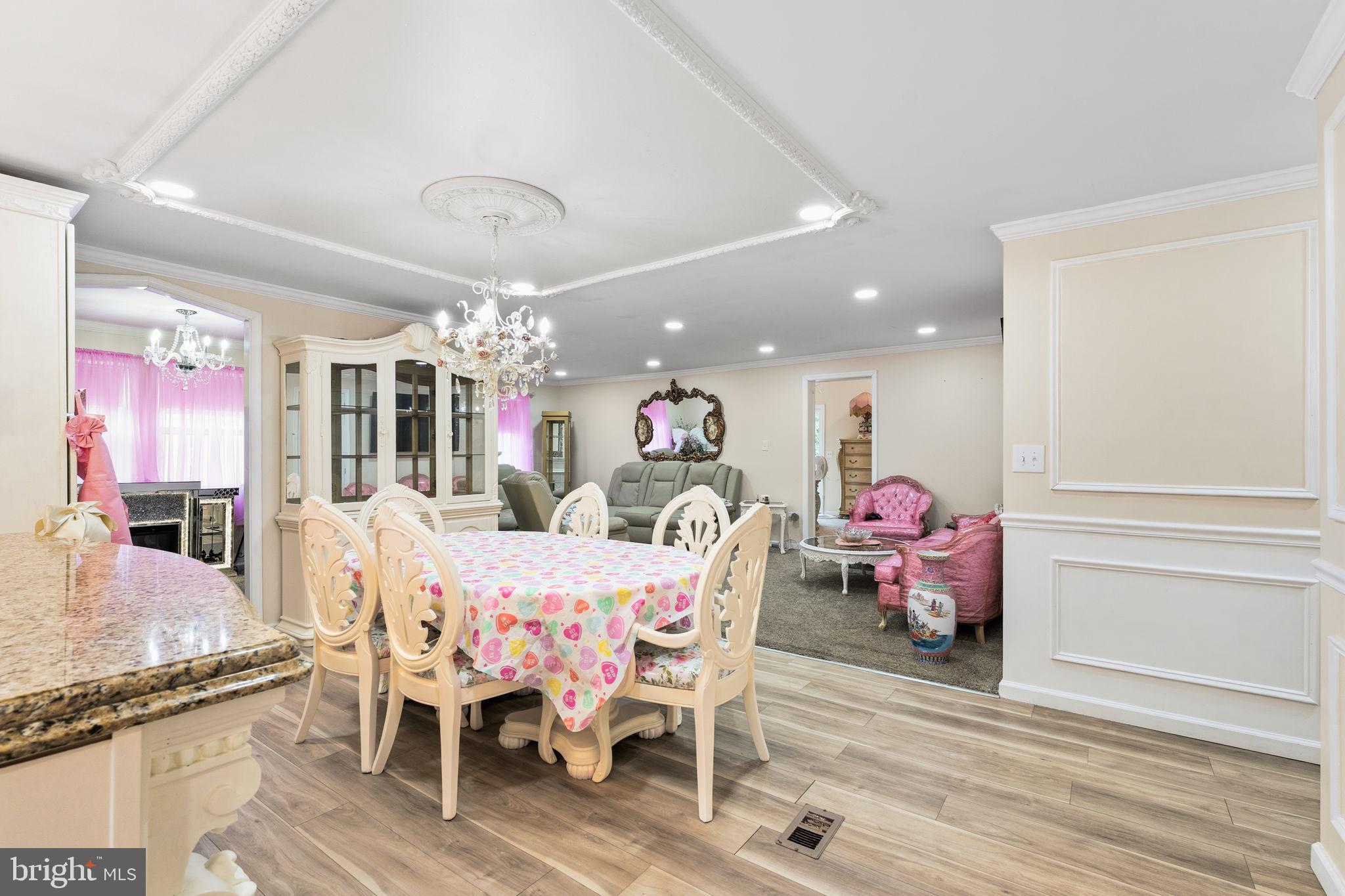 252 Red Pump Road Rising Sun, MD 21911 - Photo 16 of 41 a view of a dining room with furniture and chandelier