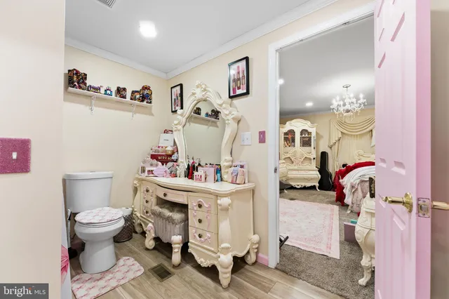 a bathroom with a sink toilet and bath tub