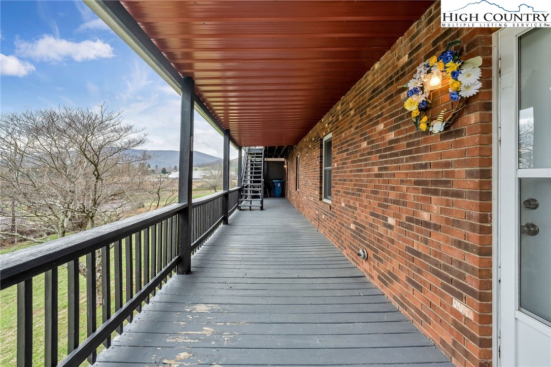 237 Valleyview Drive Jefferson, NC 28640 - Photo 33 of 42 a view of a balcony with wooden floor