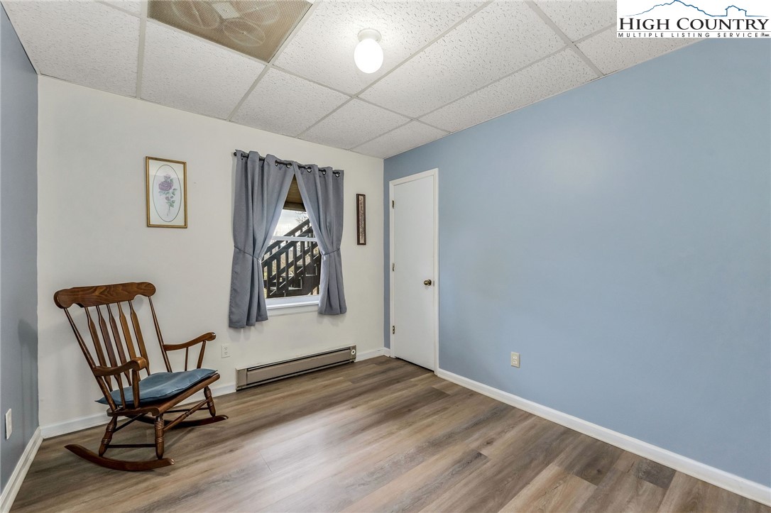 237 Valleyview Drive Jefferson, NC 28640 - Photo 39 of 42 a view of room with a window and wooden floor