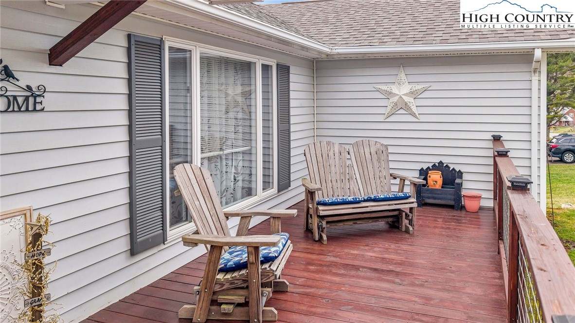 237 Valleyview Drive Jefferson, NC 28640 - Photo 7 of 42 a roof deck with a table and chairs