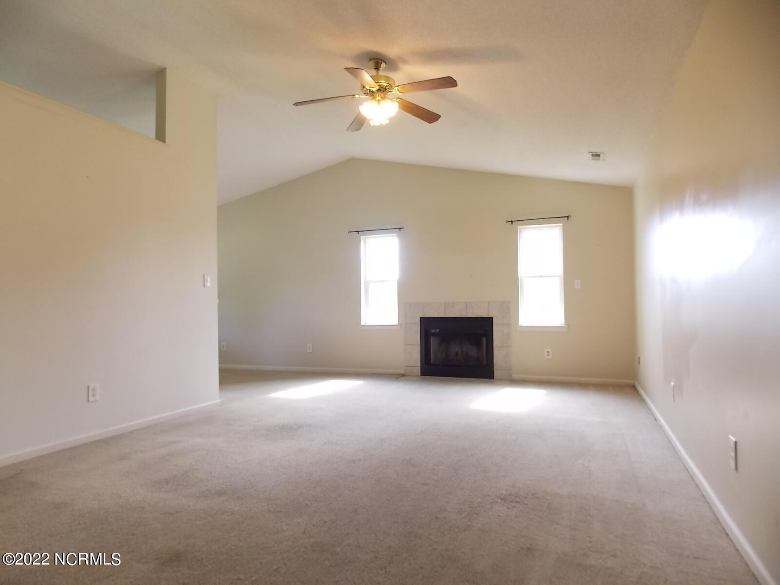 881 Sand Ridge Road Hubert, NC 28539 - Photo 3 of 25 Living room w/fireplace