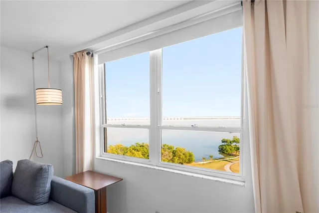 a room with a window and a table