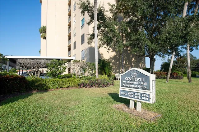 a view of a street with sign board