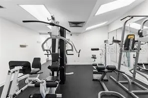 a view of a swimming pool and an outdoor seating