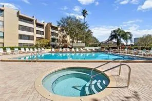 a view of a room with wooden floor and staircase