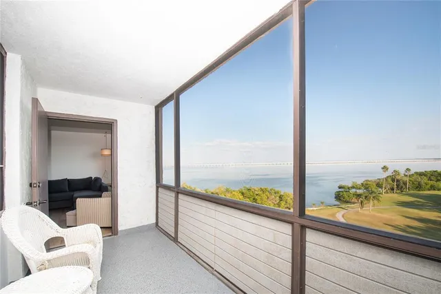 a view of a large room with a balcony