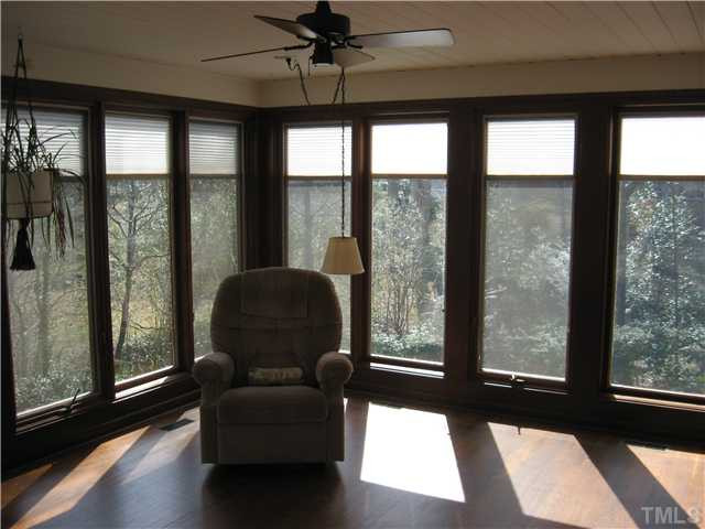 719 Runnymede Road Raleigh, NC 27607 - Photo 9 of 25 Sun room also has Pella windows that provide great view of back yard and stream. Sun Room