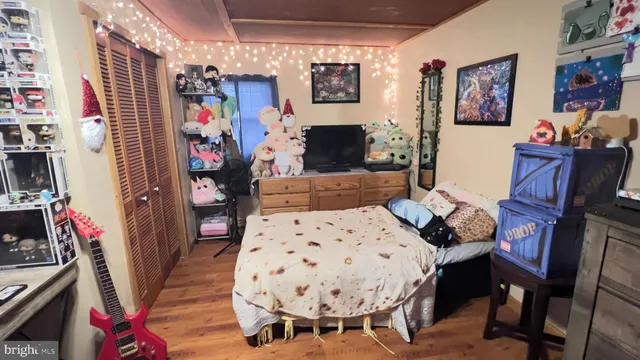 a bedroom with furniture and a bed