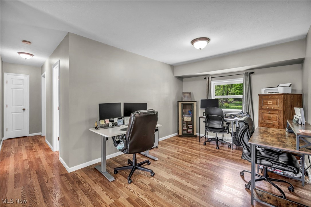 7662 State Road Wadsworth, OH 44281 - Photo 18 of 49 Home office featuring wood finished floors and baseboards