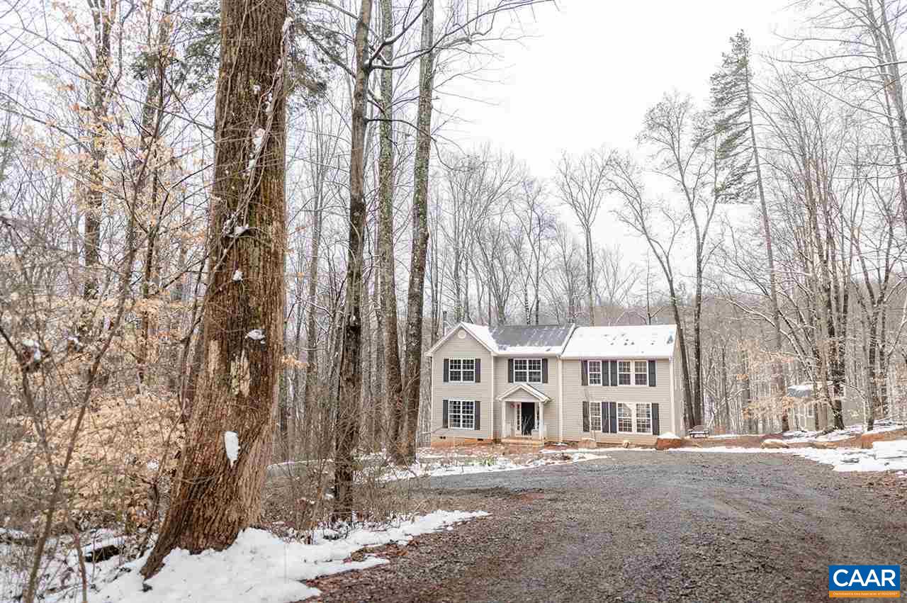 3683 Irish Road Esmont, VA 22937 - Photo 2 of 42 a view of a large white house with a snow in the yard
