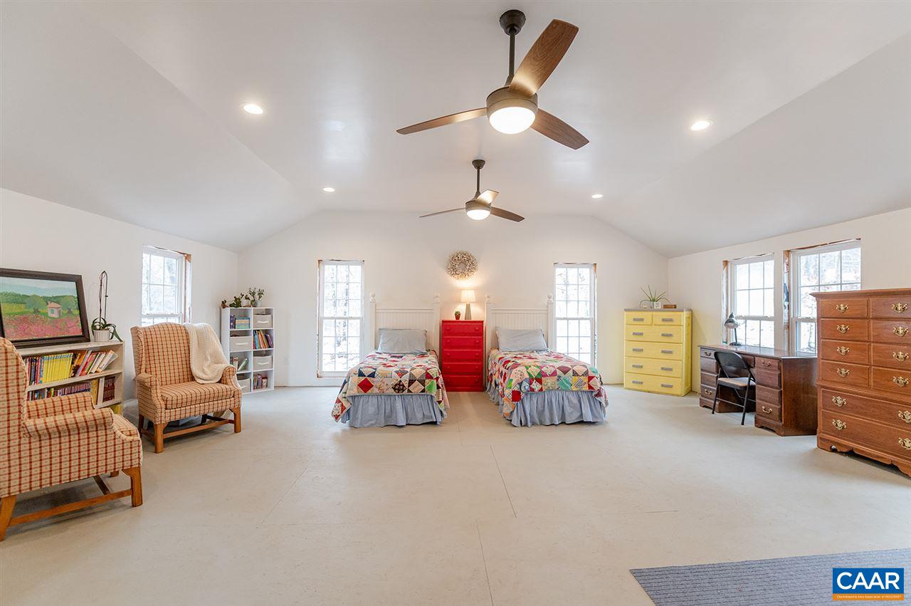 3683 Irish Road Esmont, VA 22937 - Photo 26 of 42 a view of a livingroom with furniture and a chandelier