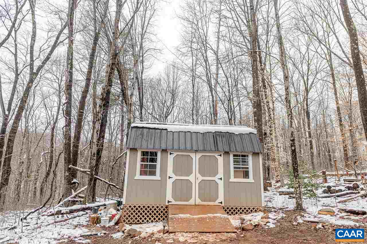 3683 Irish Road Esmont, VA 22937 - Photo 42 of 42 a front view of a house with a yard
