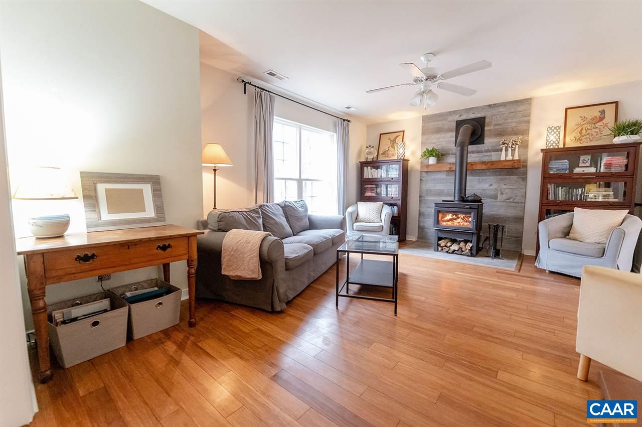 3683 Irish Road Esmont, VA 22937 - Photo 6 of 42 a bedroom with furniture and a wooden floor