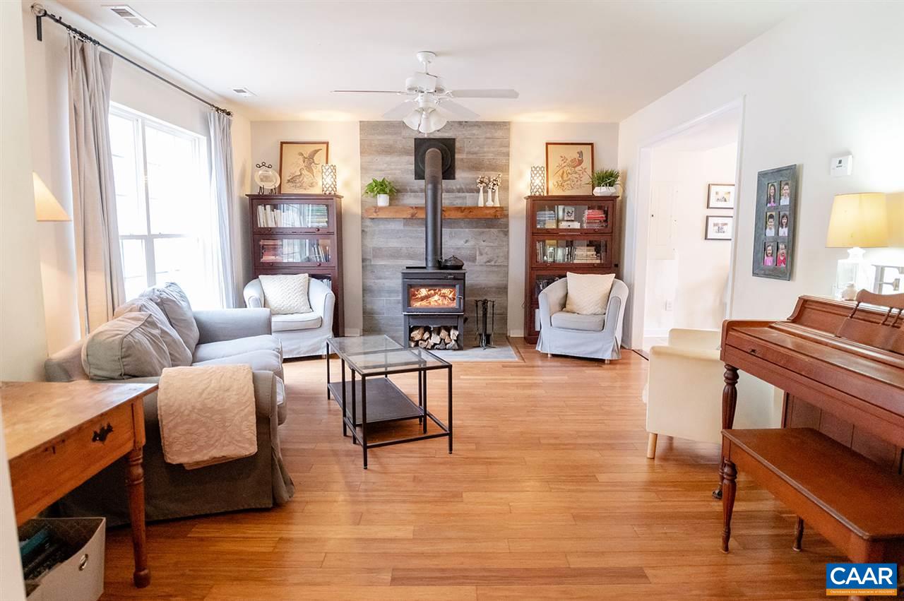 3683 Irish Road Esmont, VA 22937 - Photo 7 of 42 a living room with furniture and a wooden floor
