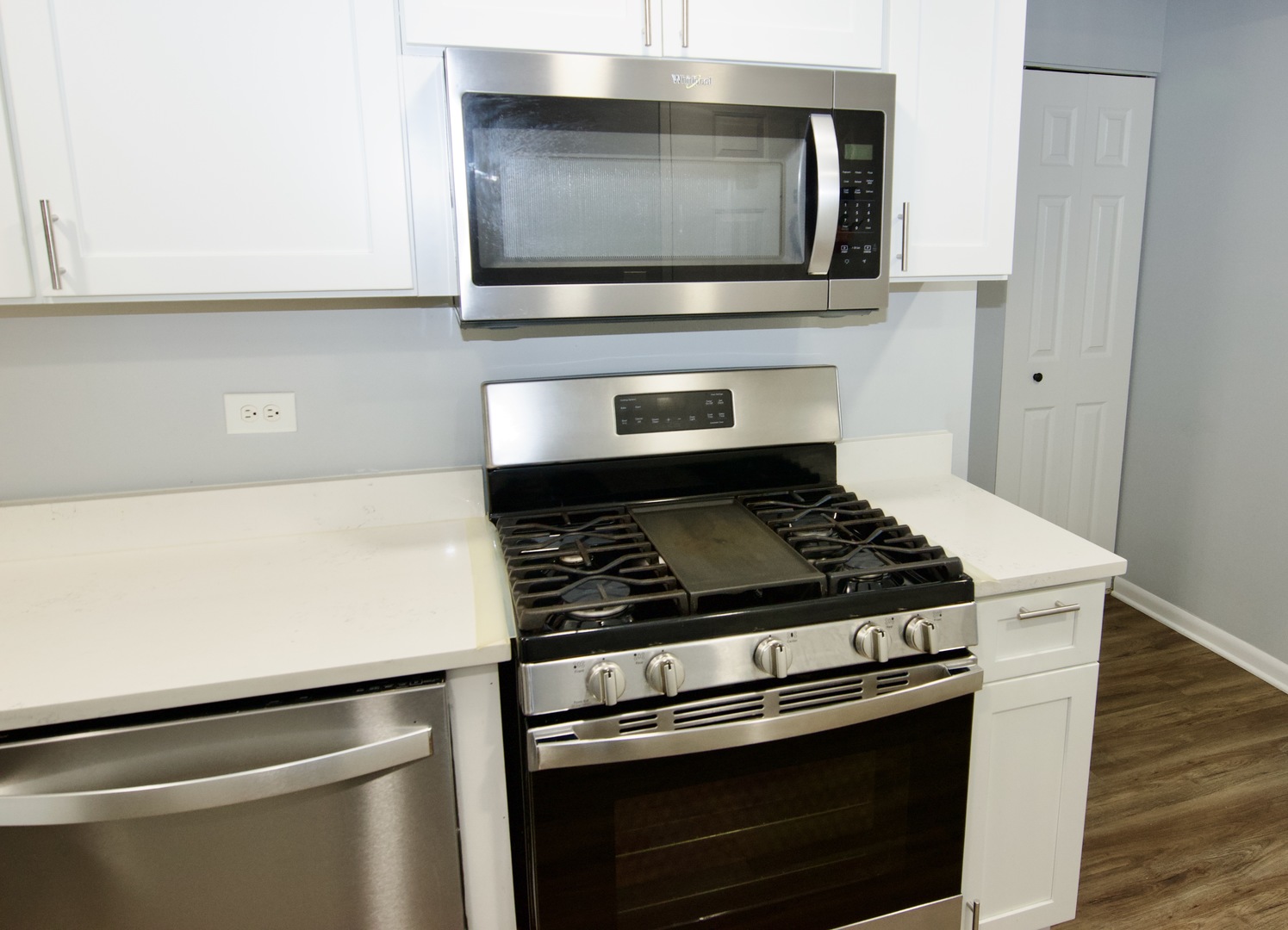 10347 Dearlove Road, Unit 301 Glenview, IL 60025 - Photo 5 of 13 a stove top oven sitting inside of a kitchen