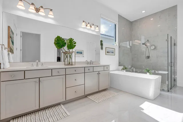 a view of storage and utility room with washer and dryer