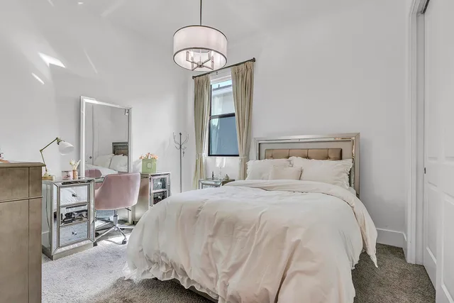 a view of a big yard with a garden