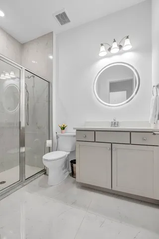 an aerial view of a residential building and lake view