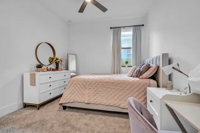 an aerial view of a house with a swimming pool