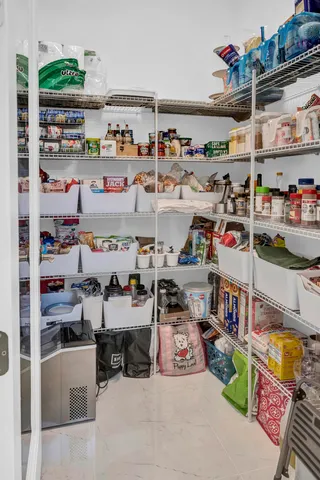 an aerial view of a house with a swimming pool yard and outdoor seating