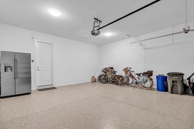 an aerial view of a house with a ocean view
