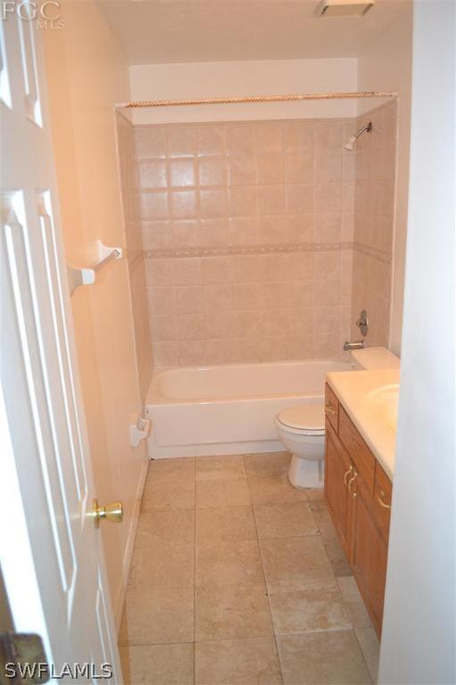 9185 Pomelo Road East Fort Myers, FL 33967 - Photo 11 of 13 a bathroom with a bathtub sink and toilet