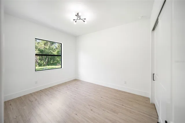 a bathroom with a shower and a toilet