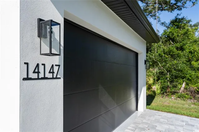 a swimming pool with trees in the background