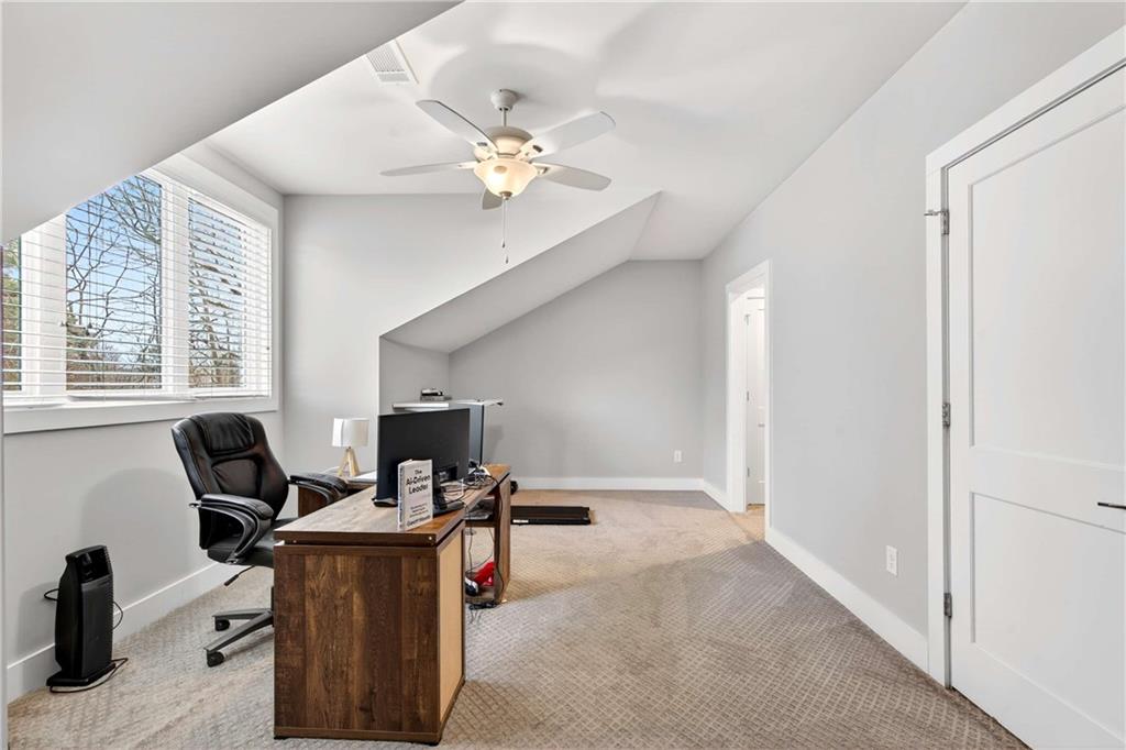 2974 Hermance Drive Northeast Atlanta, GA 30319 - Photo 19 of 38 a view of a workspace with furniture and a window