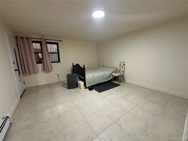 a room with a table and a mirror