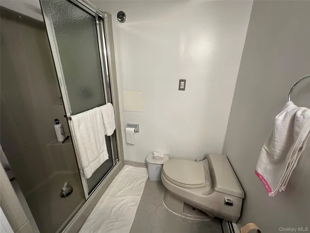 a en suite bathroom with a sink and mirror