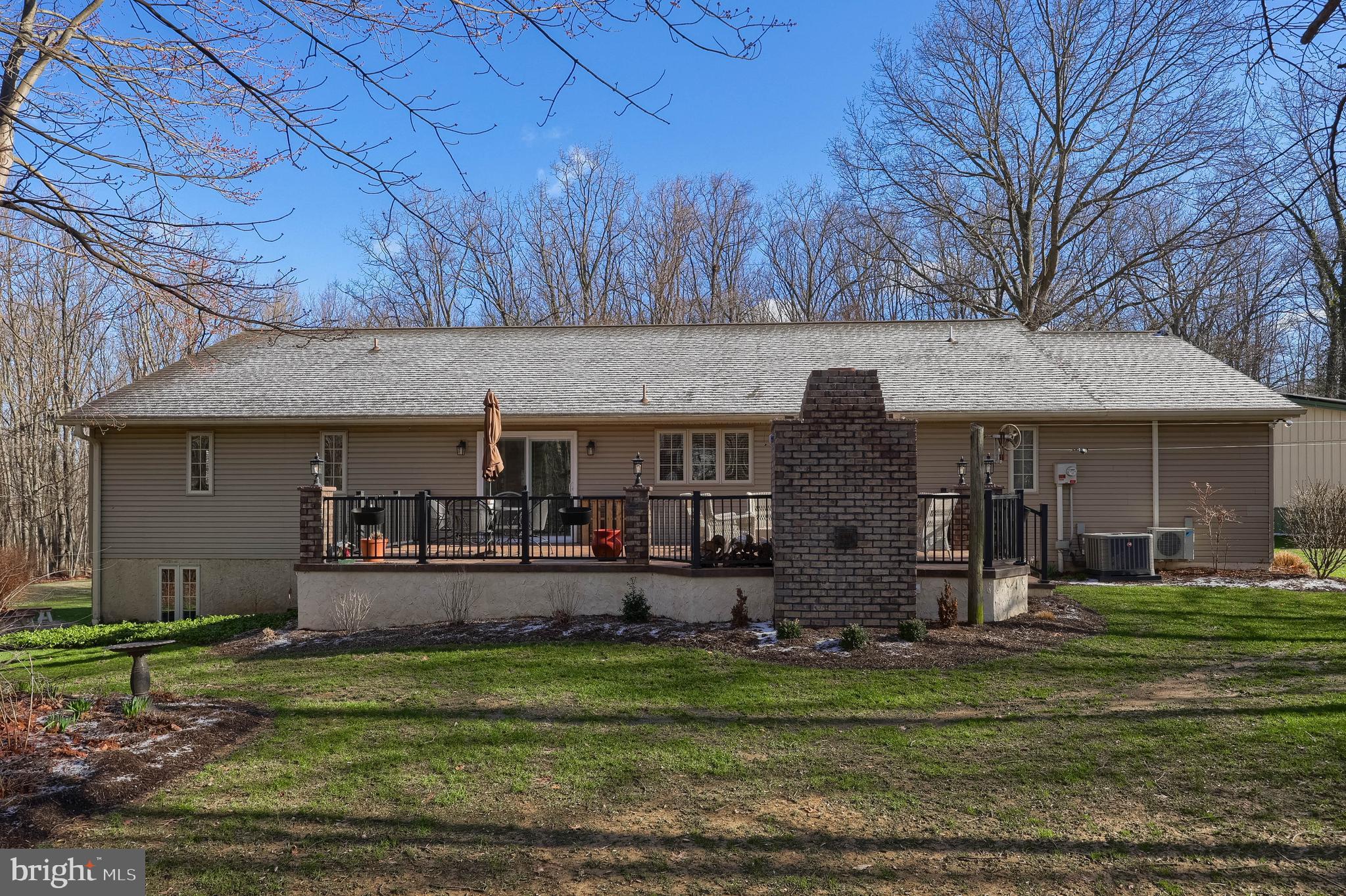 1624 Springville Road New Holland, PA 17557 - Photo 6 of 85 a view of a house with backyard and trees