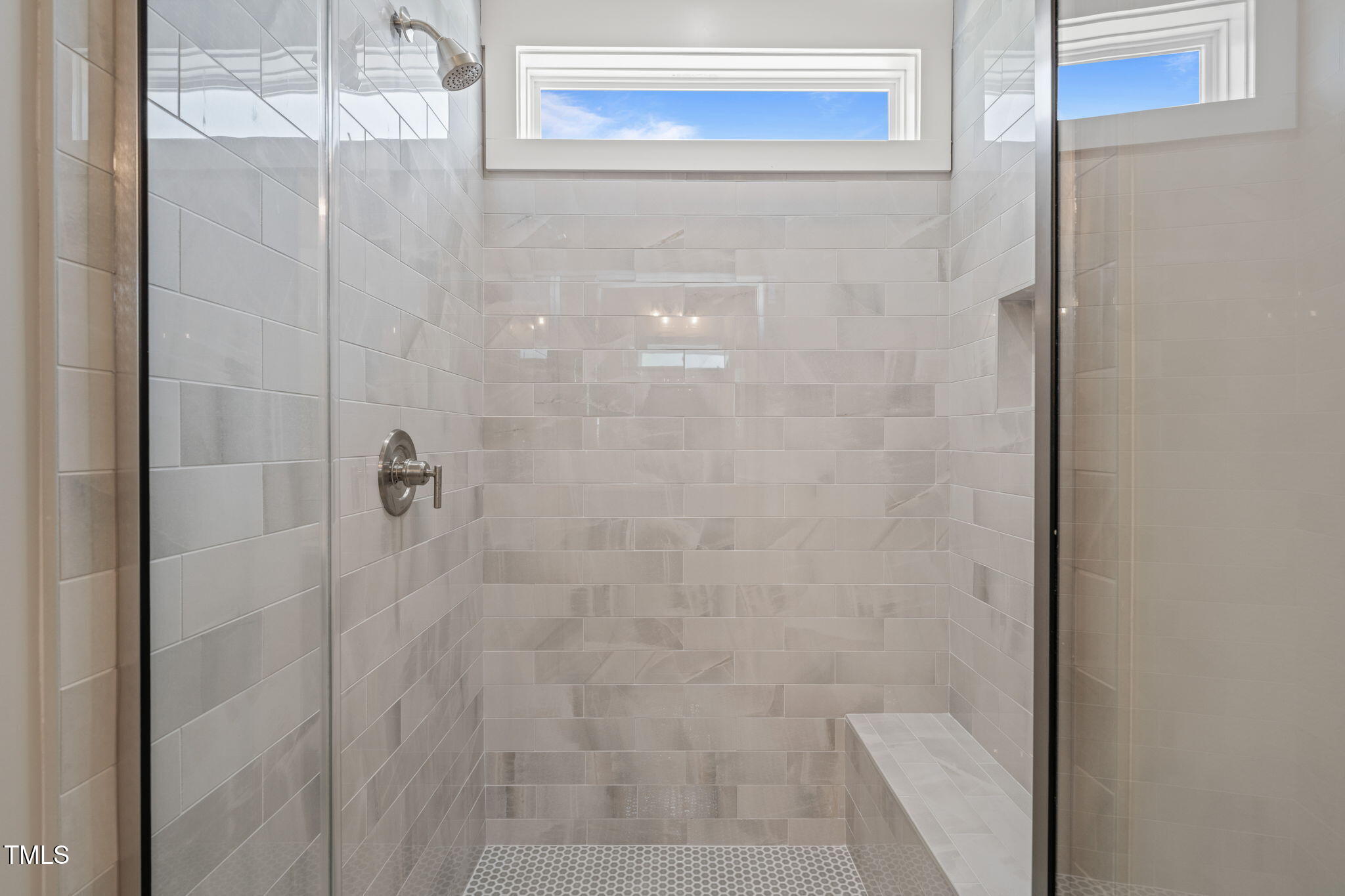 260 Pilot Ridge Road Zebulon, NC 27597 - Photo 18 of 39 a bathroom with a glass shower door