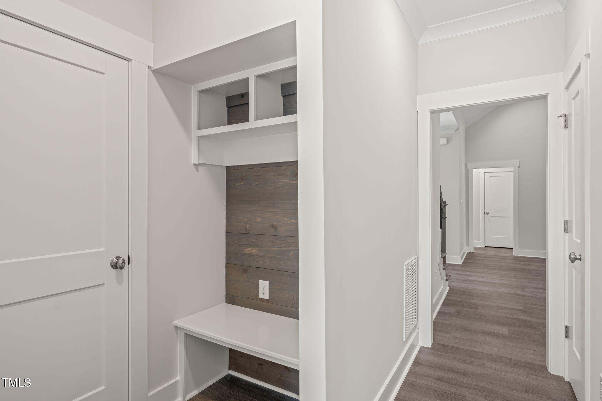 260 Pilot Ridge Road Zebulon, NC 27597 - Photo 21 of 39 a hallway with front door and wooden floor