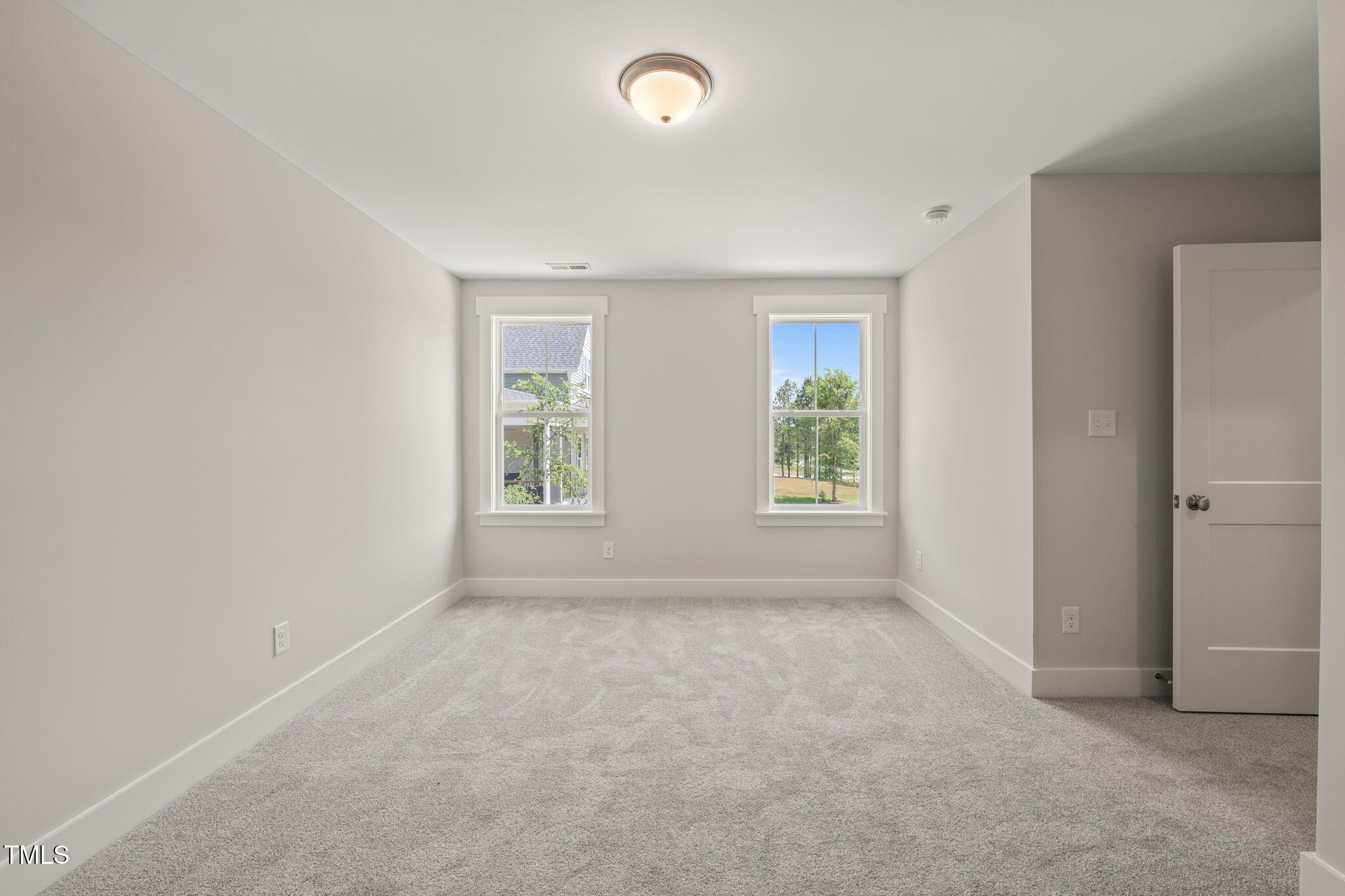 260 Pilot Ridge Road Zebulon, NC 27597 - Photo 28 of 39 an empty room with windows