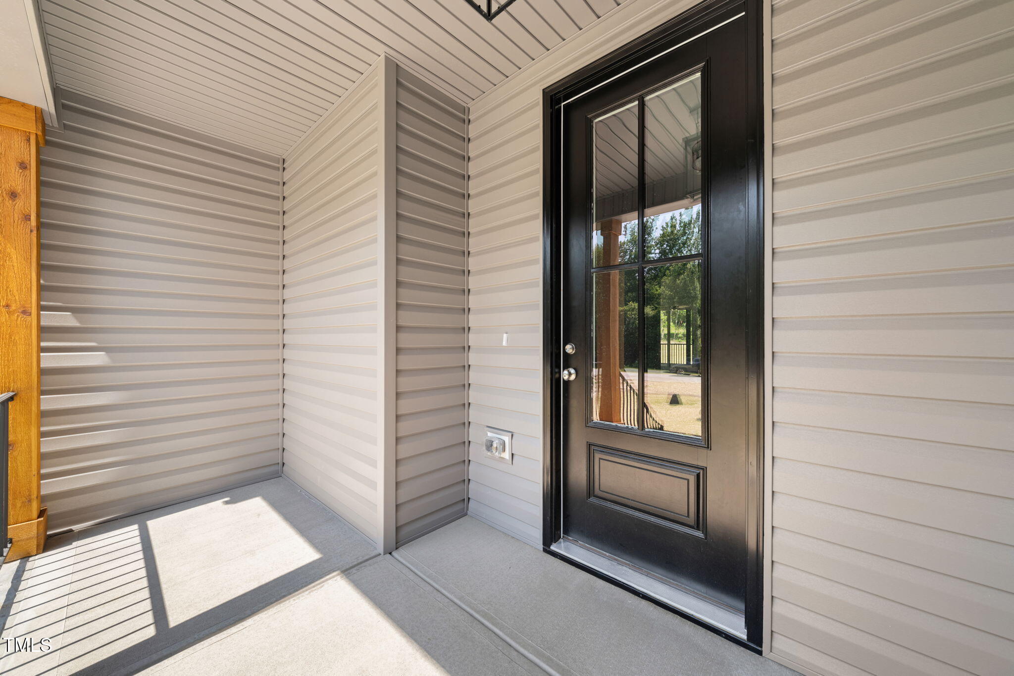 260 Pilot Ridge Road Zebulon, NC 27597 - Photo 3 of 39 a view of a door and a window of the house
